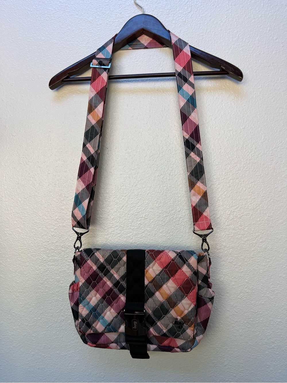 Lug harness crossbody bag